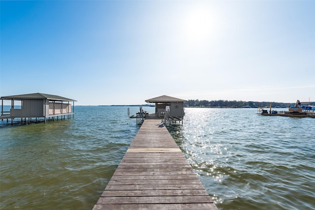 dock area with a water view