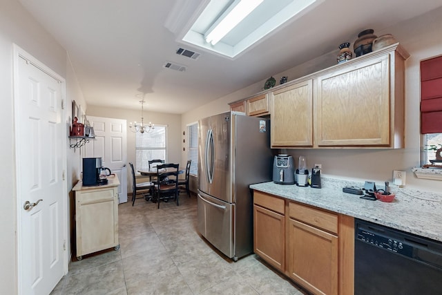 kitchen with decorative light fixtures, stainless steel fridge, black dishwasher, a notable chandelier, and light stone countertops