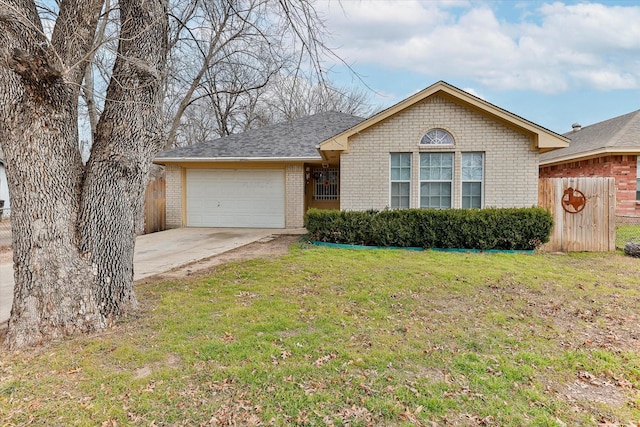 ranch-style house with a front yard and a garage