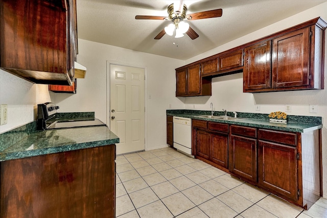 kitchen featuring white dishwasher, range, light tile patterned floors, sink, and ceiling fan