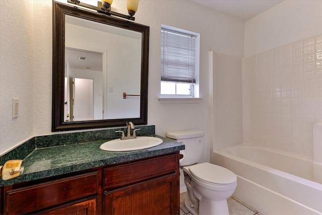 full bathroom with shower / bathing tub combination, tile patterned floors, vanity, and toilet