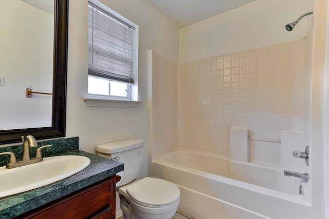 full bathroom featuring tub / shower combination, toilet, and vanity