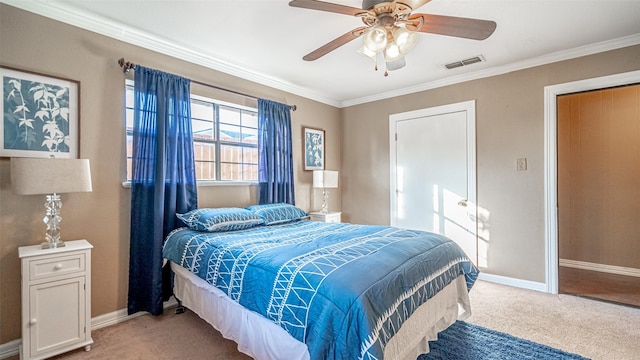 bedroom featuring ceiling fan, ornamental molding, and light carpet