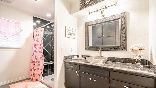 bathroom featuring vanity, crown molding, and a shower with shower curtain