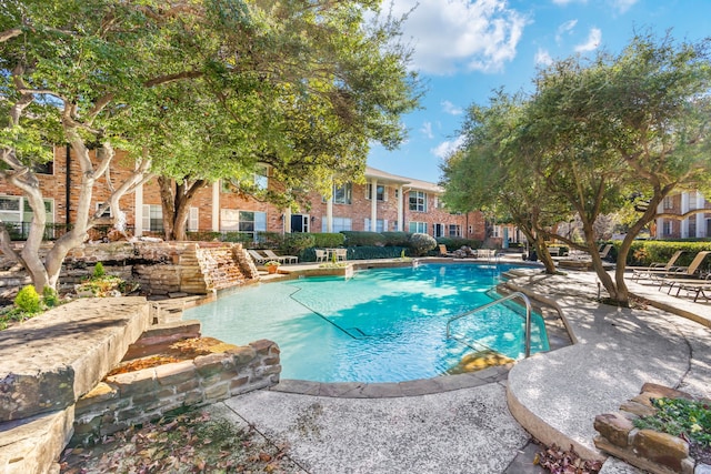 view of pool with a patio area