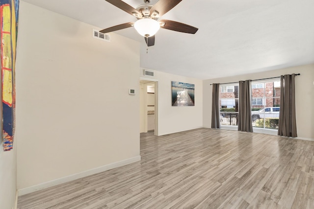 unfurnished room with ceiling fan and light hardwood / wood-style floors