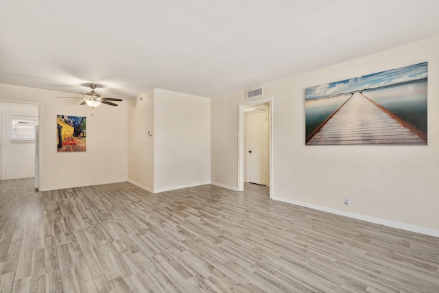 unfurnished room with ceiling fan and light hardwood / wood-style floors