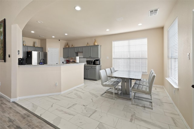 dining room with a healthy amount of sunlight