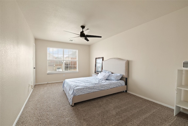 bedroom featuring ceiling fan and carpet flooring