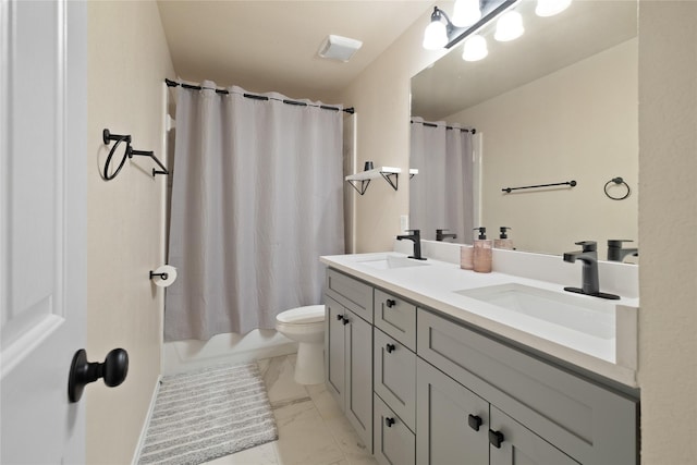 full bathroom with vanity, toilet, and shower / tub combo with curtain