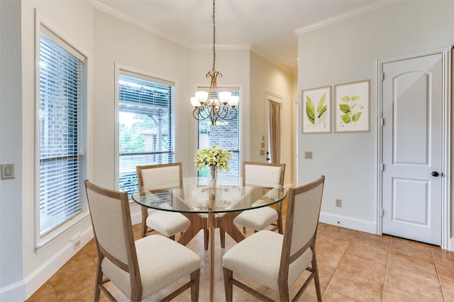 dining area with light tile patterned flooring, a chandelier, and ornamental molding