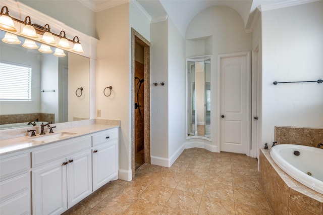 bathroom with vanity, ornamental molding, and shower with separate bathtub