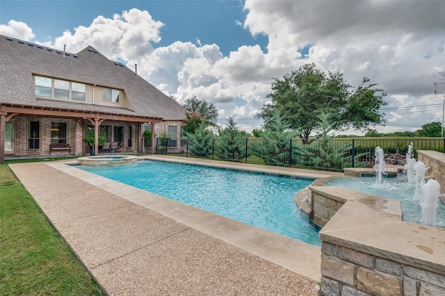 view of swimming pool featuring an in ground hot tub and pool water feature