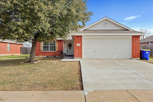 single story home featuring a garage and a front lawn