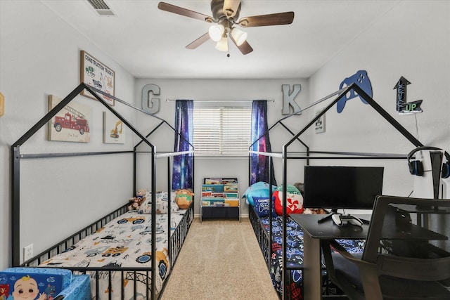 carpeted bedroom featuring ceiling fan