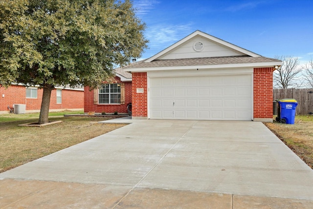 single story home featuring a garage, central AC unit, and a front yard