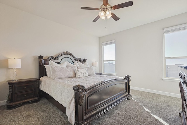 bedroom with ceiling fan and carpet flooring