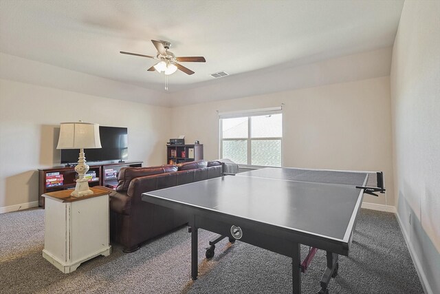 rec room with visible vents, carpet flooring, baseboards, and ceiling fan