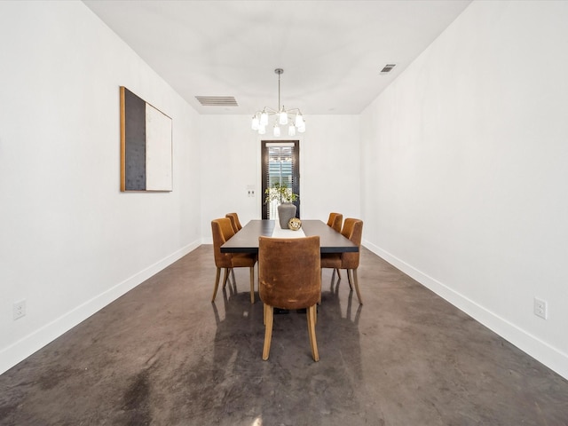 dining space featuring a chandelier