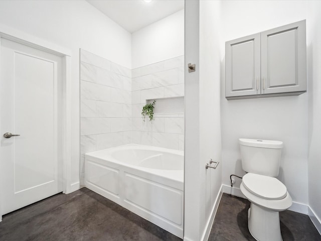 bathroom featuring a tub, toilet, and concrete floors