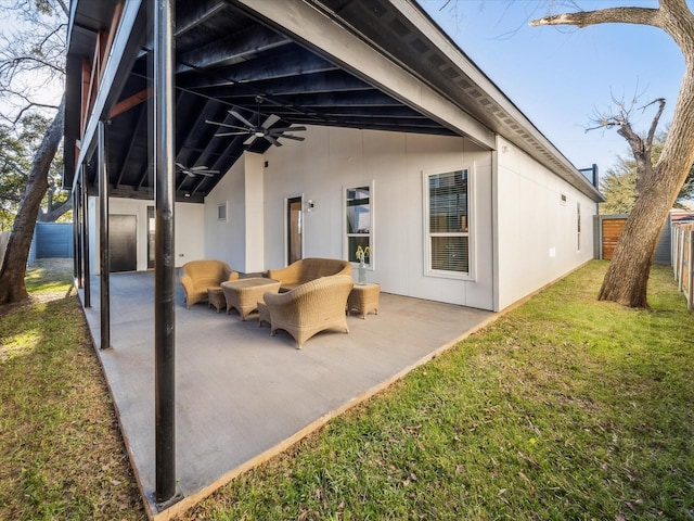 view of patio / terrace featuring ceiling fan