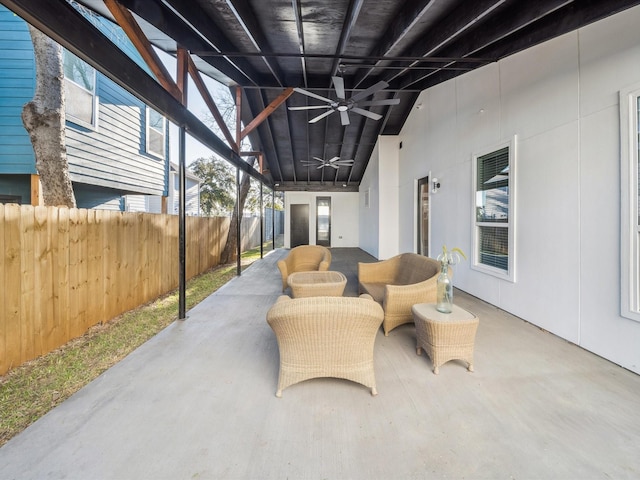 view of patio featuring ceiling fan