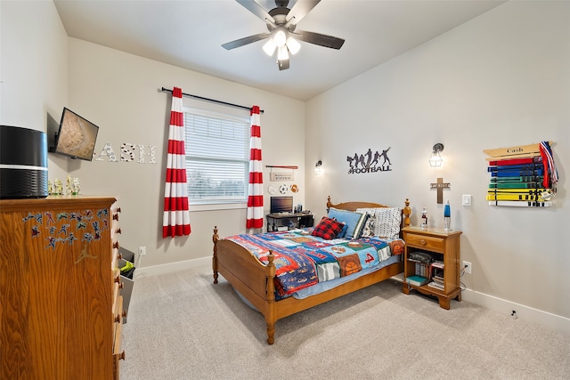 carpeted bedroom with ceiling fan