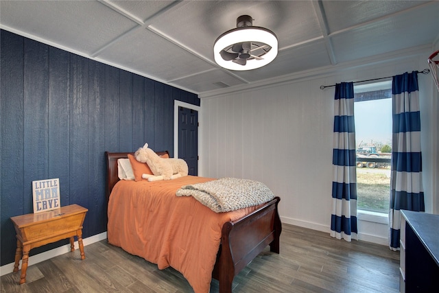 bedroom with dark wood-type flooring