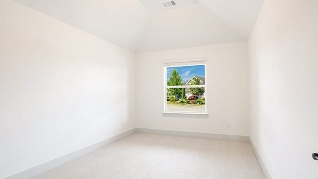 1804 Wittington Pl, Farmers Branch, TX 75234 - unfurnished room featuring lofted ceiling, light colored carpet, and baseboards
