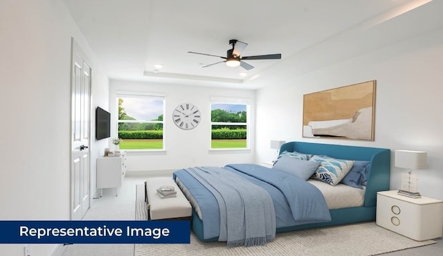 1804 Wittington Pl, Farmers Branch, TX 75234 - carpeted bedroom with a raised ceiling and a ceiling fan