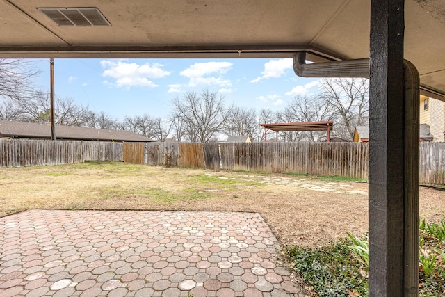 view of yard with visible vents, a patio, and a fenced backyard