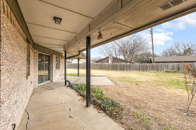 view of patio featuring a fenced backyard and visible vents