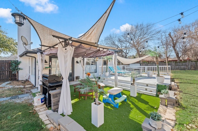 exterior space featuring a deck and a pergola