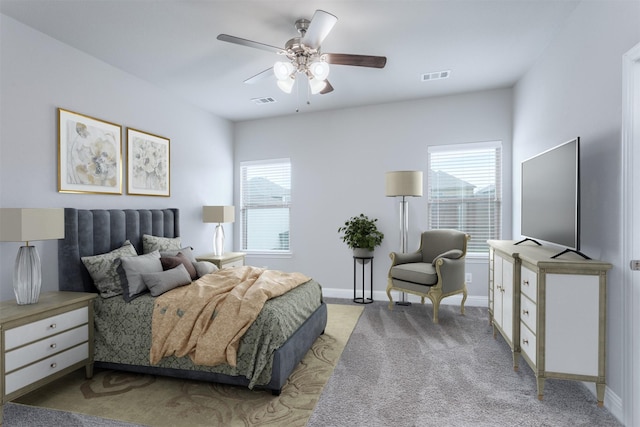 bedroom featuring ceiling fan and light colored carpet