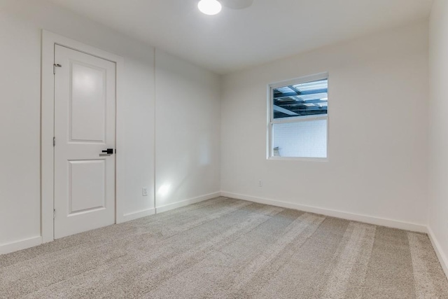 empty room featuring carpet flooring