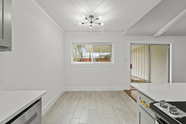 kitchen featuring ornamental molding, a chandelier, light hardwood / wood-style flooring, and stainless steel stove