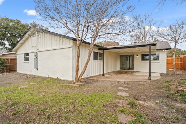 exterior space featuring a patio area and a yard