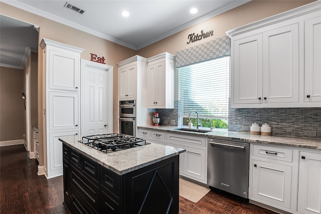 kitchen featuring sink, white cabinets, dark hardwood / wood-style flooring, and stainless steel appliances