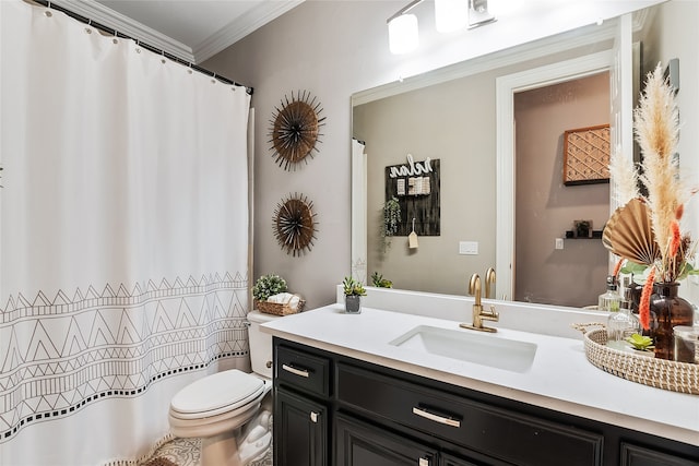 bathroom with crown molding, toilet, and vanity