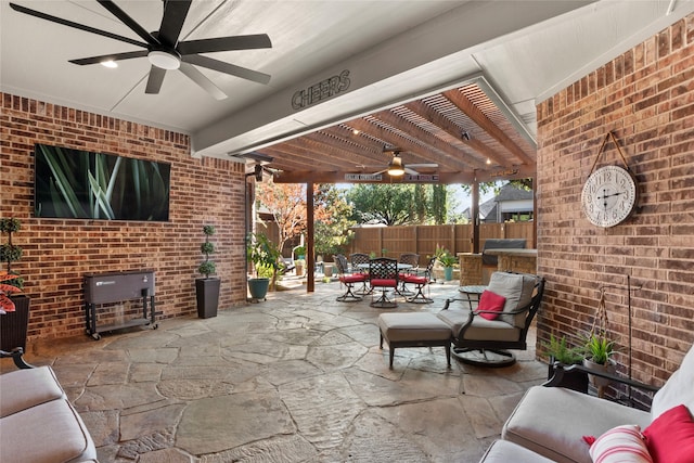 view of patio with ceiling fan, an outdoor hangout area, and a pergola