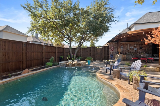 view of swimming pool with a patio area