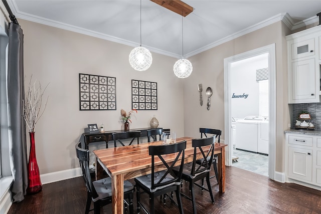 dining room featuring dark hardwood / wood-style flooring, crown molding, and independent washer and dryer