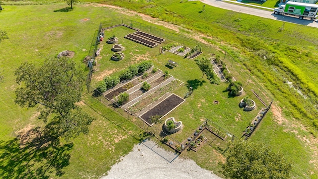 birds eye view of property with a rural view