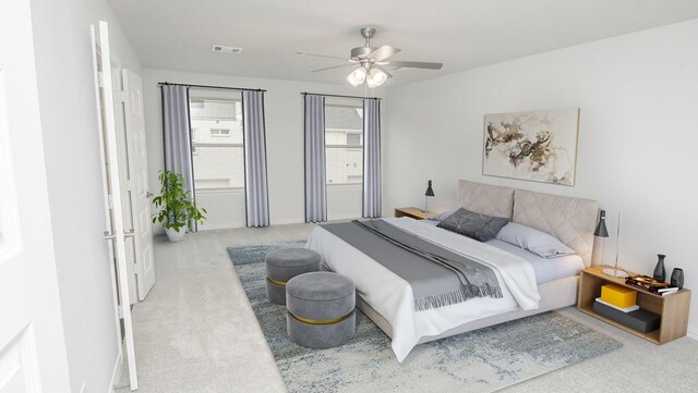 bedroom featuring light colored carpet and ceiling fan