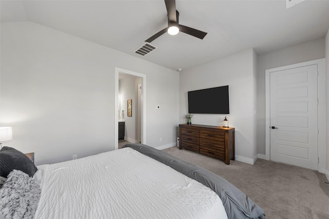 bedroom featuring vaulted ceiling, ceiling fan, and light colored carpet