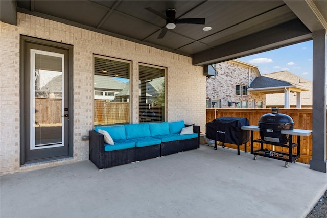 view of patio / terrace featuring ceiling fan, a grill, and outdoor lounge area