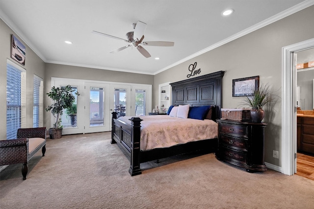 carpeted bedroom with ceiling fan, ensuite bathroom, access to exterior, and crown molding