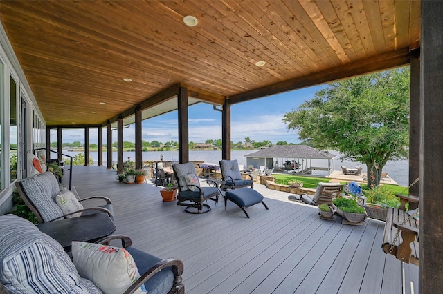 deck featuring a water view