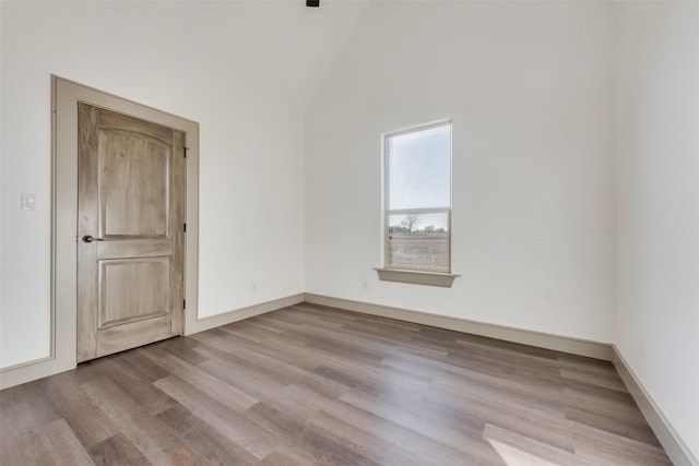 unfurnished room with light hardwood / wood-style flooring