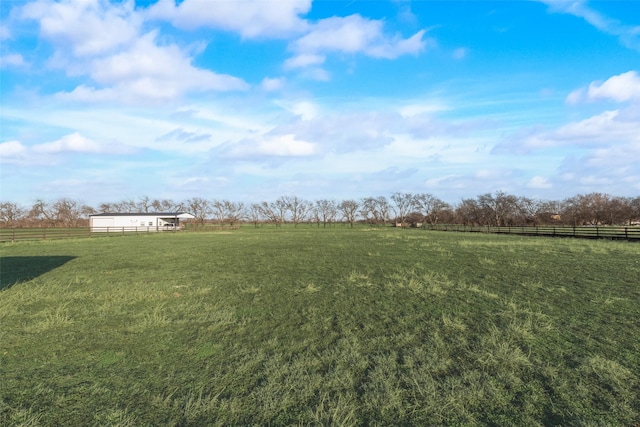 view of yard featuring a rural view